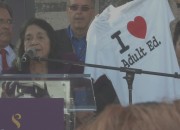 Dolores Huerta circulates a petition in favor of adult education at her 82nd birthday party.